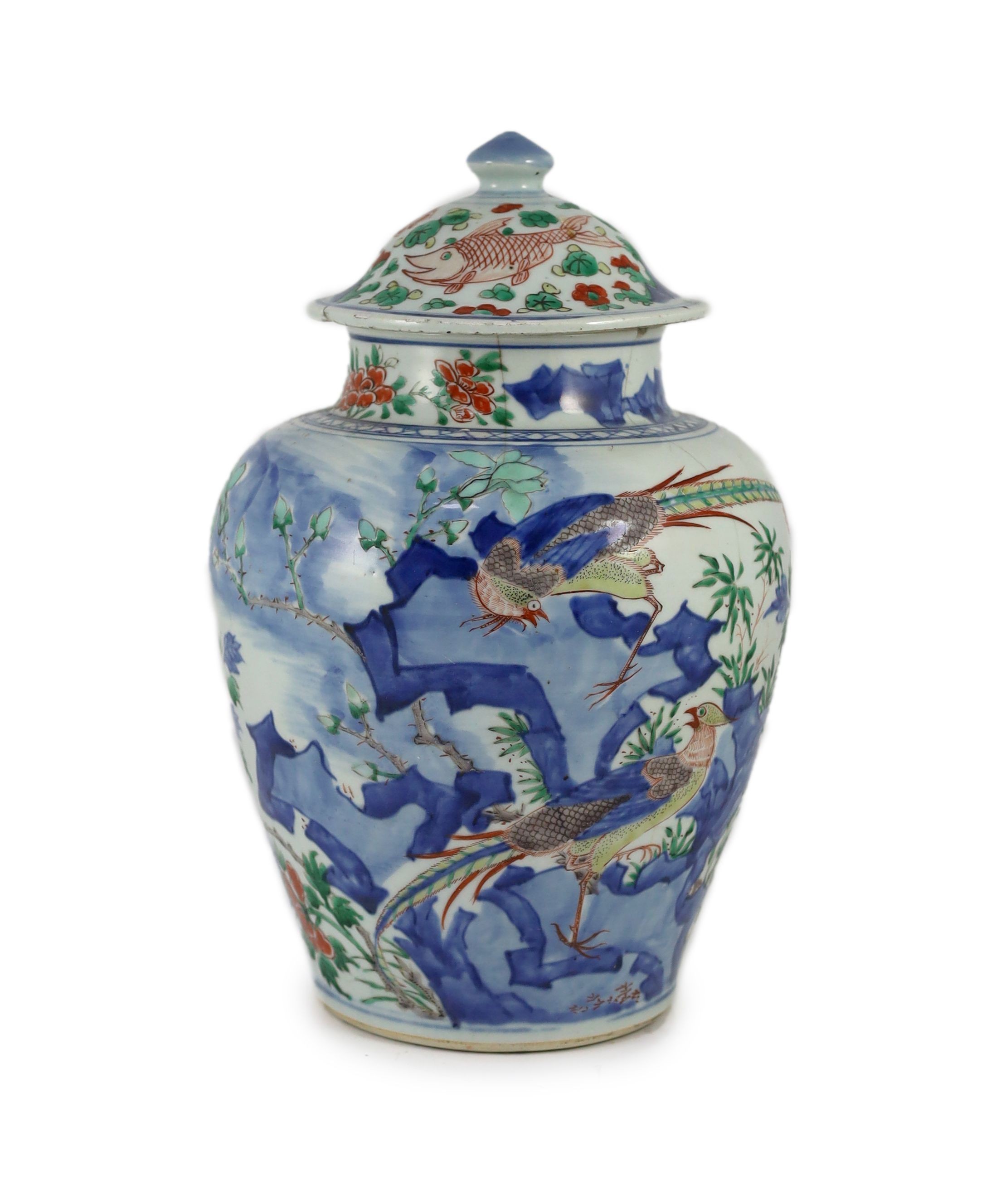 A Chinese transitional wucai jar and cover, c.1650, 36cm high, some damage